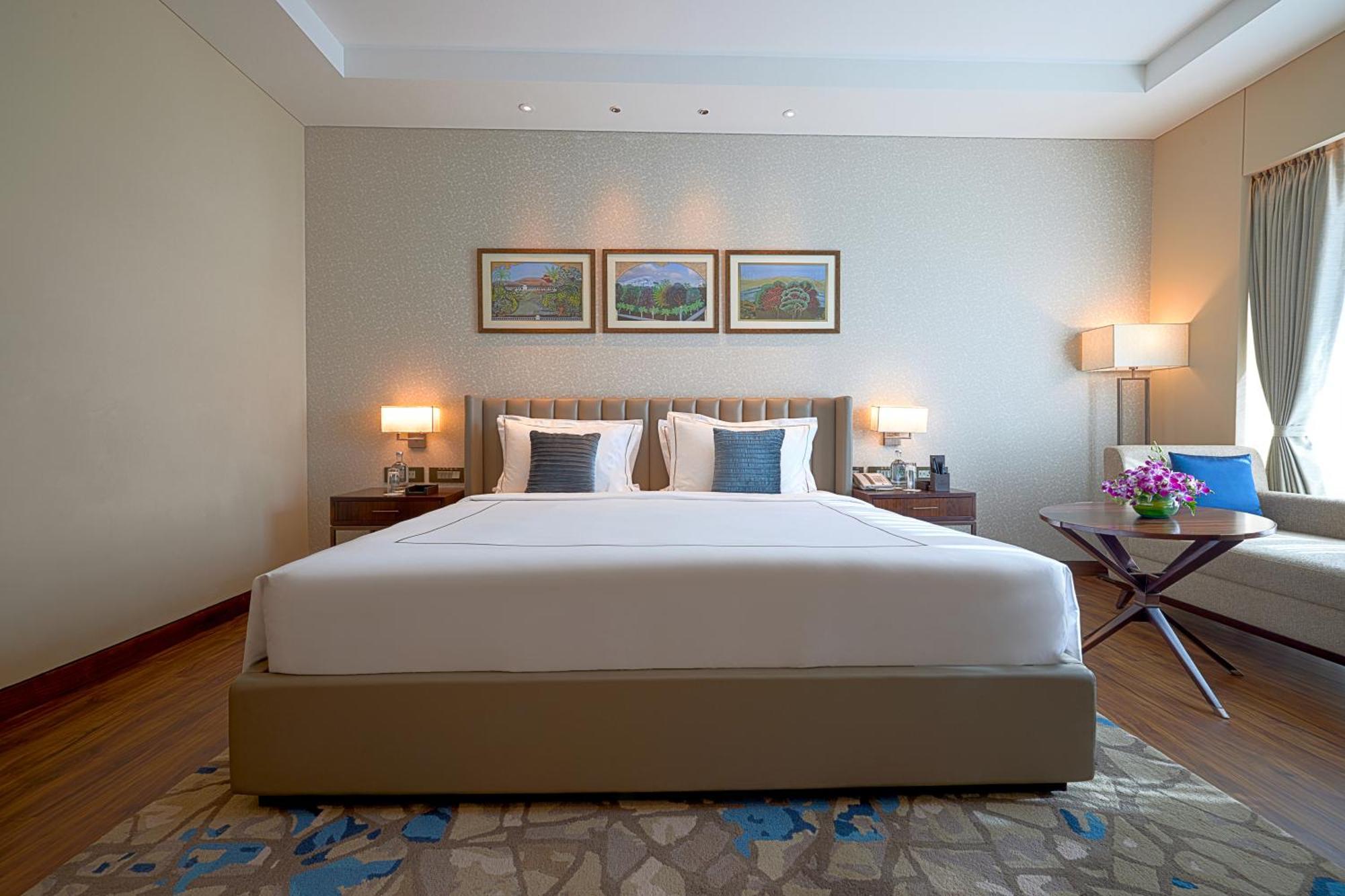 Taj Bangalore Devanahalli Kültér fotó A bedroom at the Taj Bengal