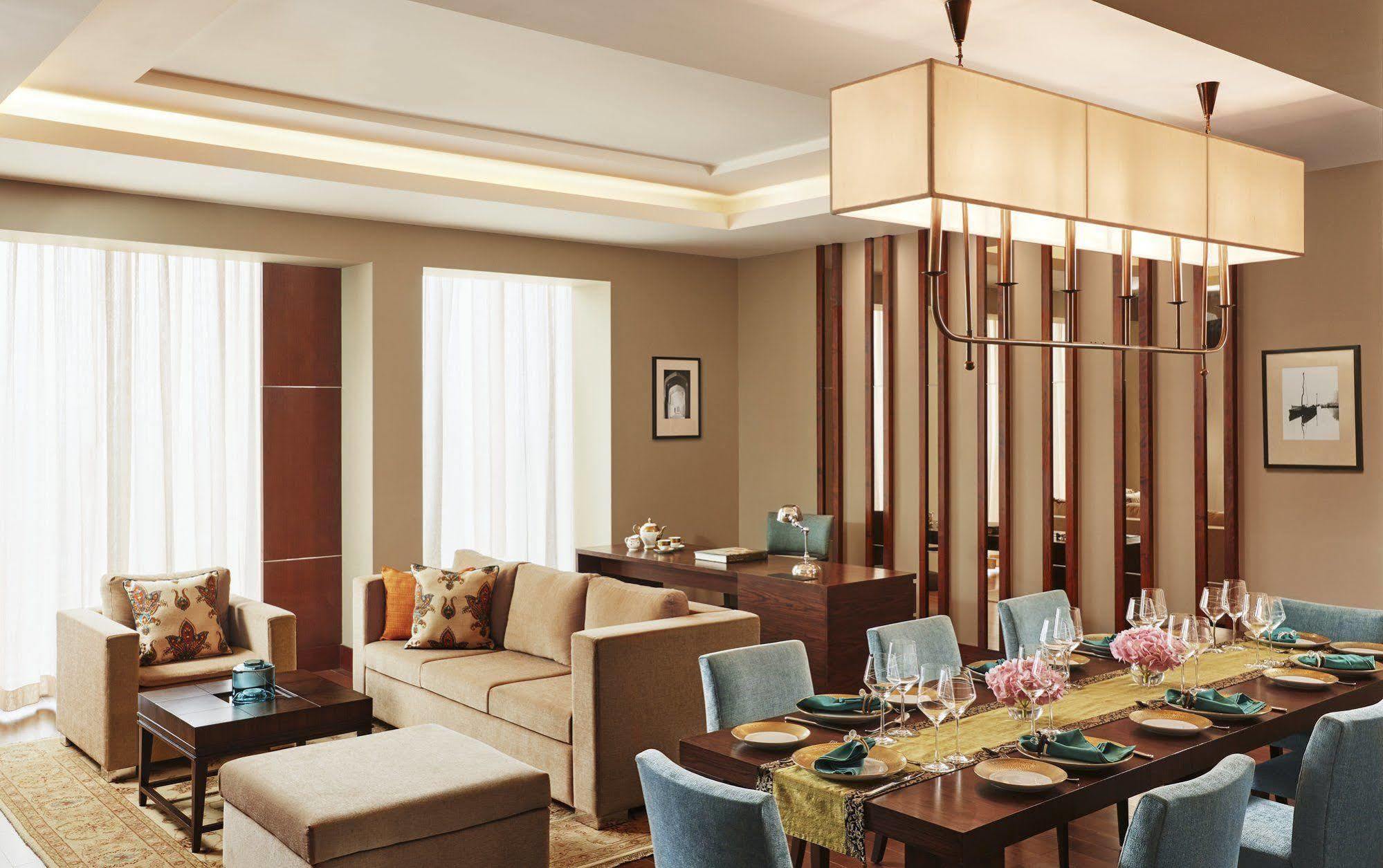 Taj Bangalore Devanahalli Kültér fotó A living room in a typical apartment